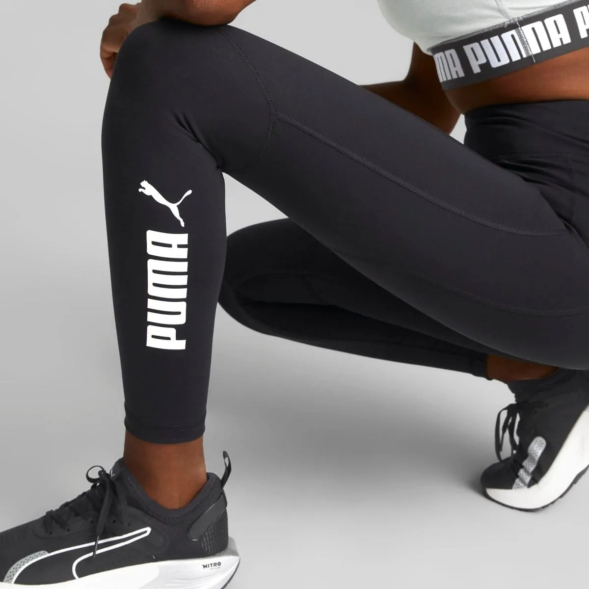 PUMA DAMEN TRAIN FAVORITE HIGH WAIST 7/8 SCHWARZE LEGGINGS